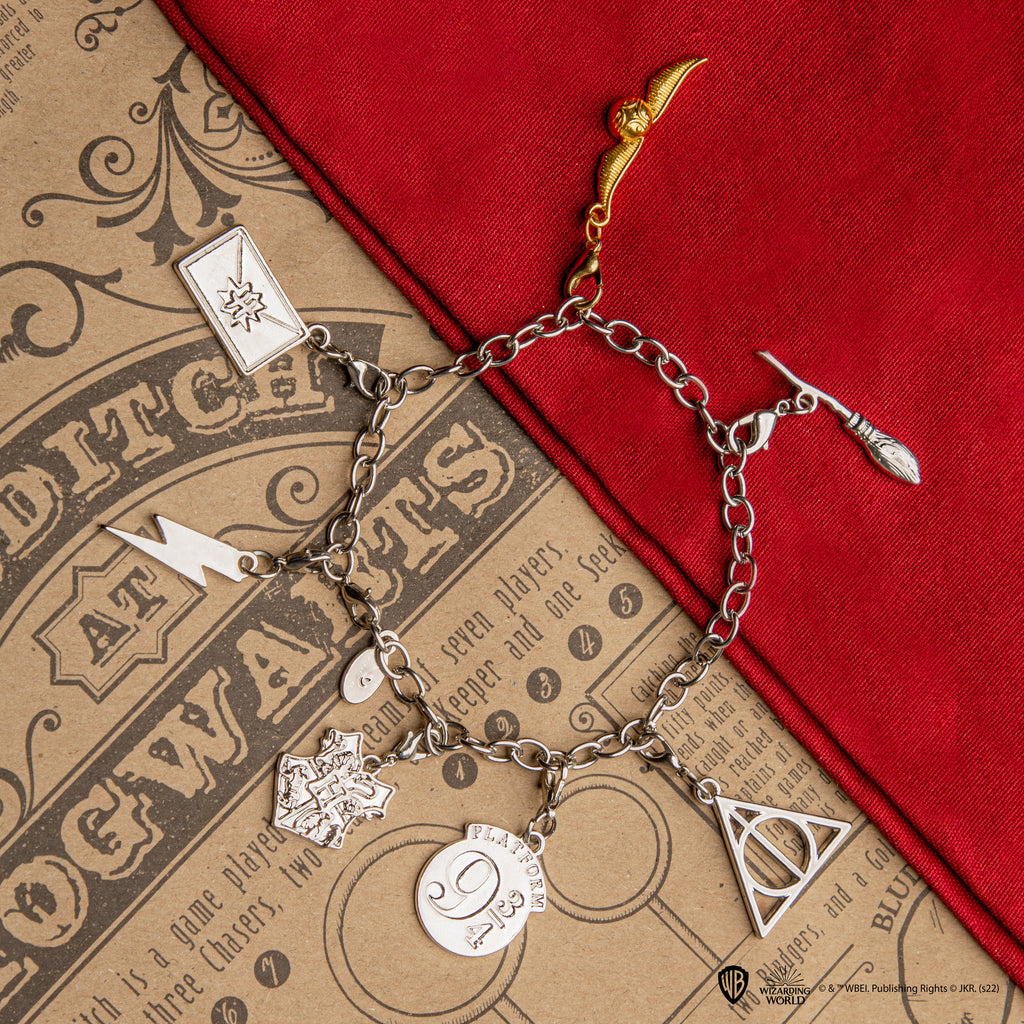 Juego de 2 dijes de Quidditch
