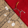 Juego de 2 dijes de Quidditch