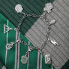 Juego de 2 dijes de Slytherin