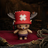 Officially licensed netflix One Piece Chopper Gomee Keymate keyring with his signature red hat and antlers on a dark wooden pirate deck by cinereplicas.